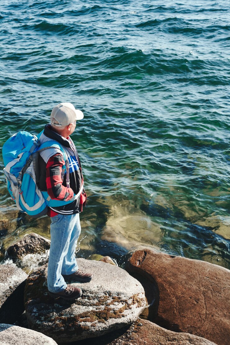 Photo Gratis man by water