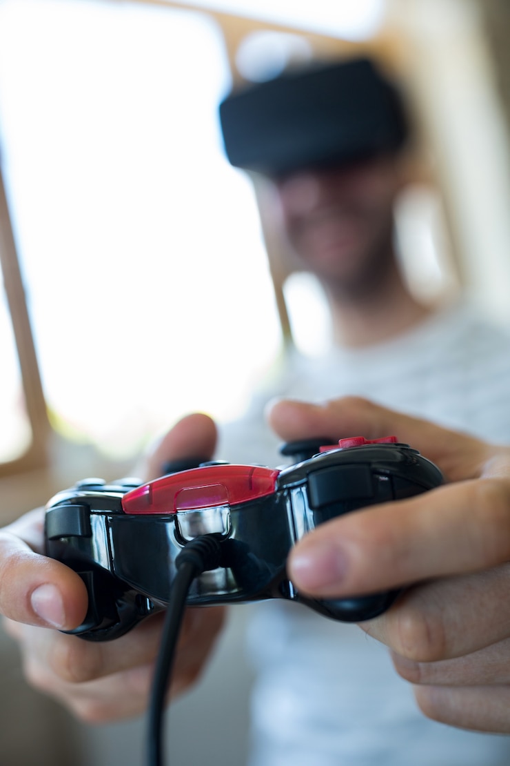 Photo Gratis man playing video game