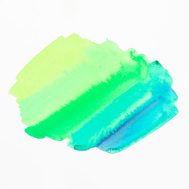 Mancha de acuarela de sombra verde y azul aislada sobre fondo blanco