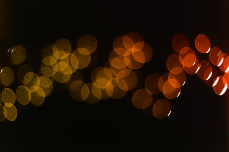 Foto gratuito manchas de luz amarillas y naranjas