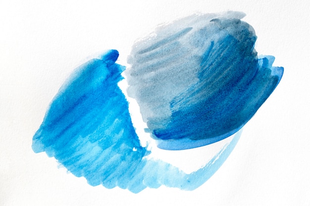 Manchas de pintura azul de arte abstracto