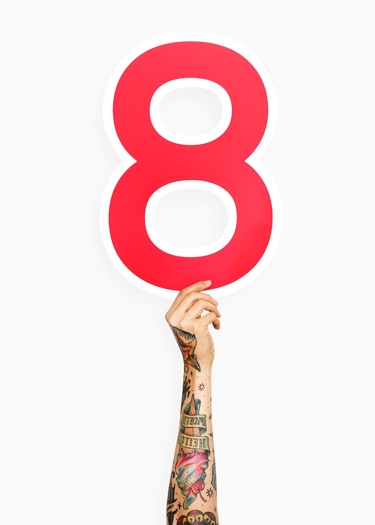 Foto gratuito mano sosteniendo el numero 8