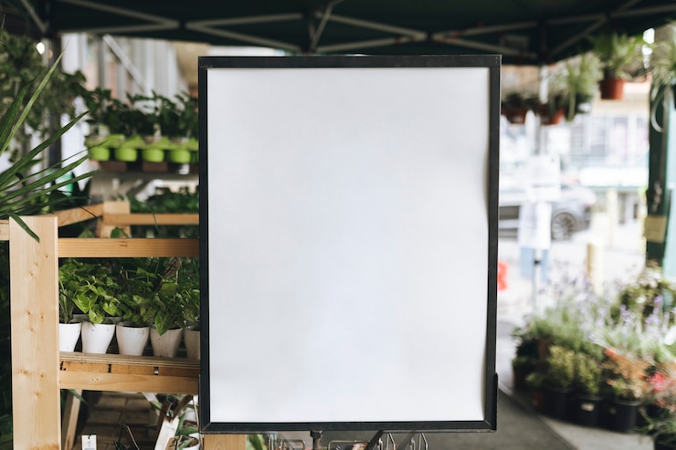 Foto gratuito maqueta de letrero de tienda enmarcado en negro