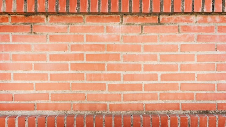Foto gratuito marco completo de la pared de ladrillo rojo