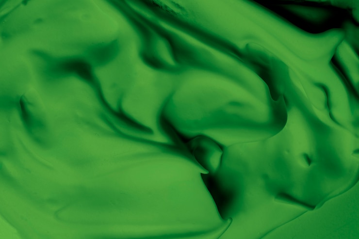 Foto gratuito marco completo de telón de fondo de textura crema verde brillante