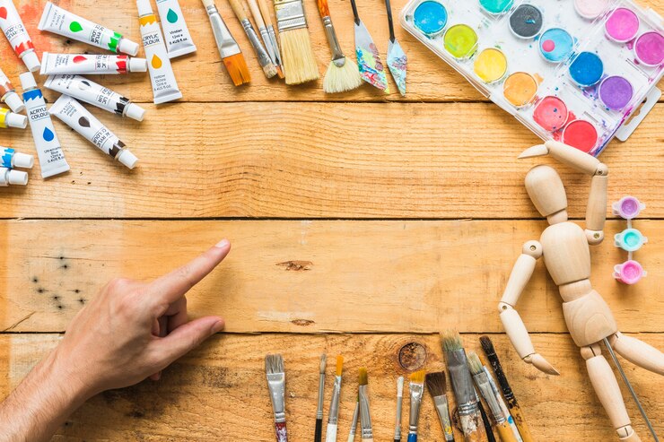 Foto gratuito marco de los elementos de pintura de la vista superior