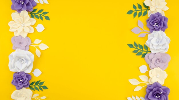Marco floral artístico con fondo amarillo