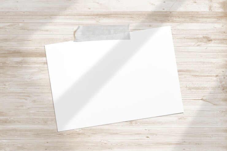 Foto gratuito marco de fotos en blanco pegado con cinta adhesiva a madera con textura con suaves sombras de ventana de adobe