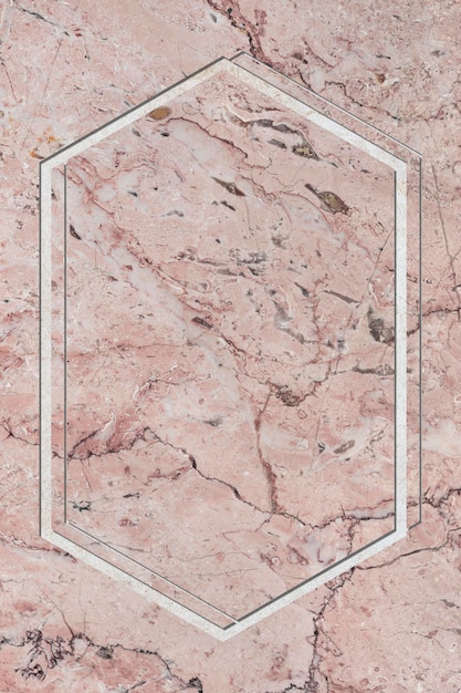 Marco hexagonal sobre fondo de textura de mármol rosa