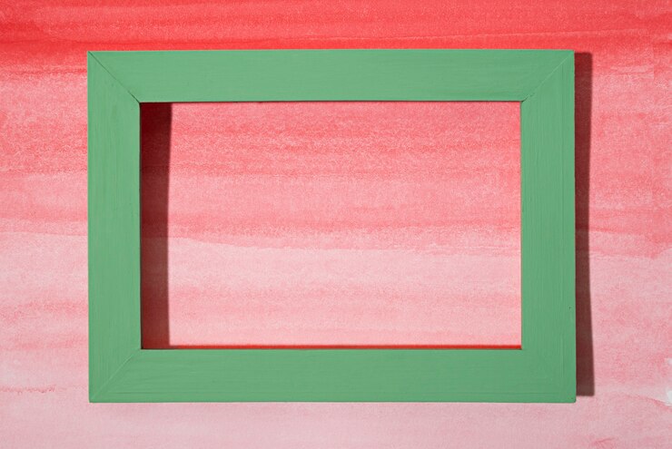 Foto gratuito marco verde sobre fondo pintado plano lay