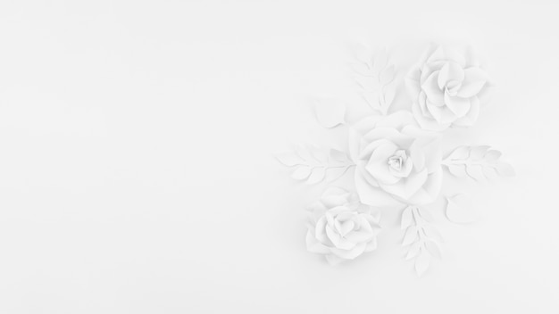 Marco de vista superior con flores de papel blanco y fondo