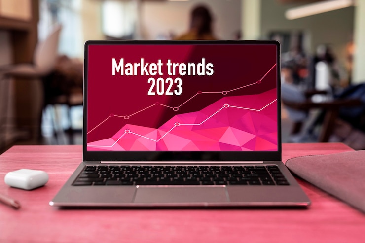 Photo Gratis market trends concept with  laptop