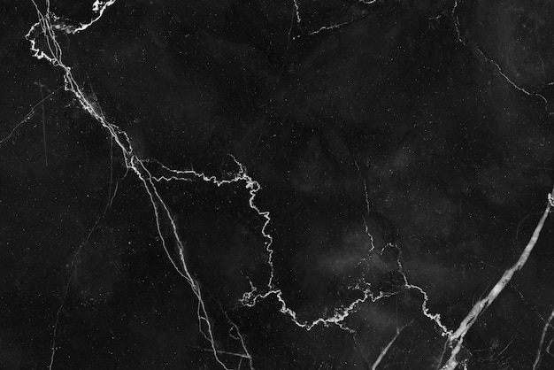 El mármol negro modeló el fondo de la textura. Mármol de Tailandia, mármol natural abstracto blanco y negro para el diseño.