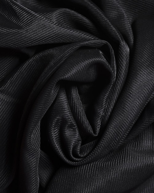Material elegante negro de seda con curvas
