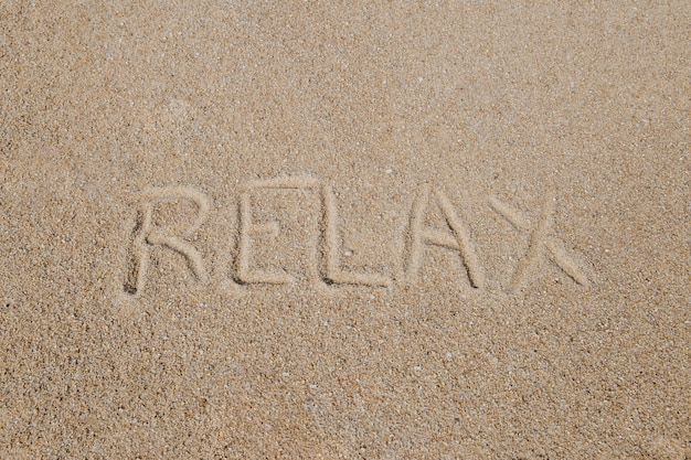 Foto gratuita mensaje en la playa de arena