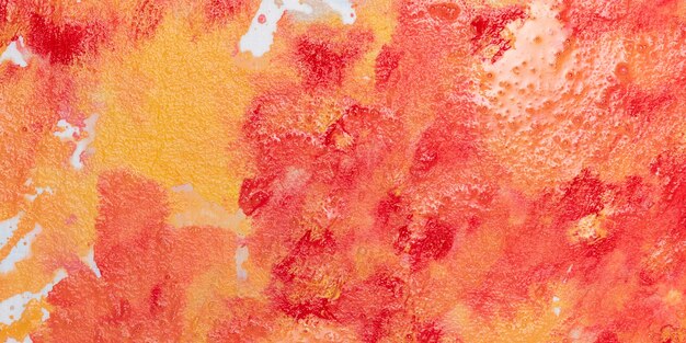 Mezcla de pintura roja y naranja