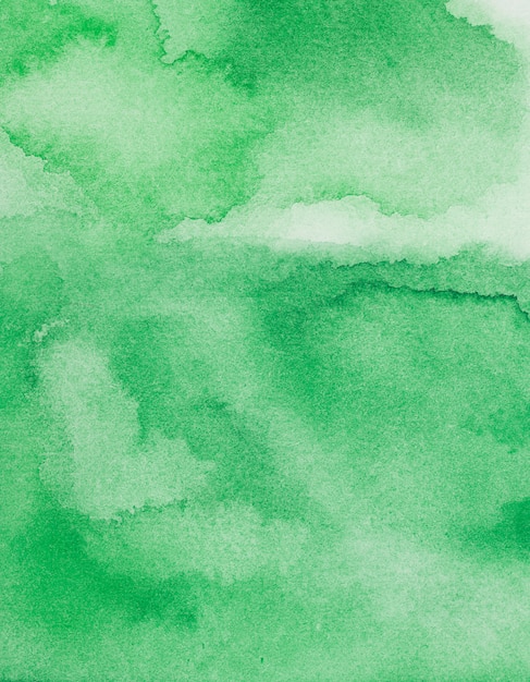 Mezcla verdosa de pinturas sobre papel.