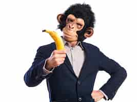 Foto gratuita mono, hombre, tenencia, plátano