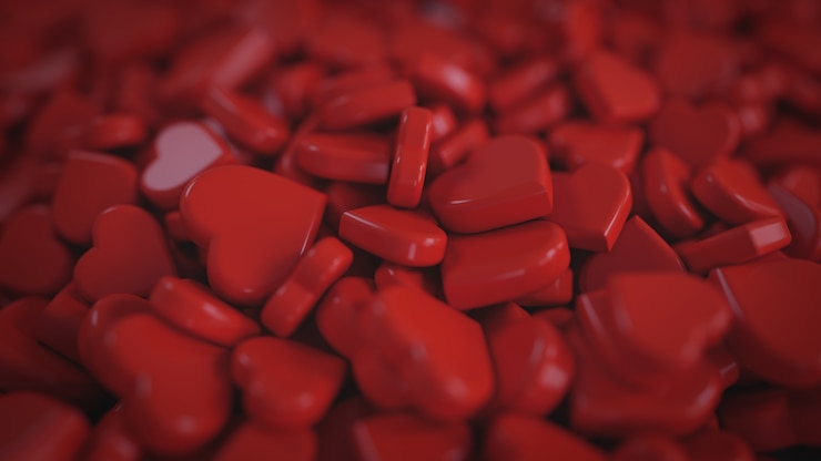 Foto gratuito montón de la forma roja del corazón 3d que rinde