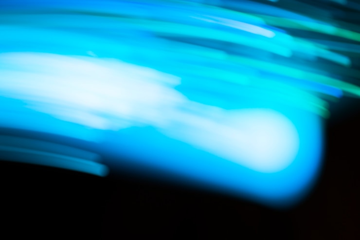 Foto gratuito movimiento borroso tonos azules