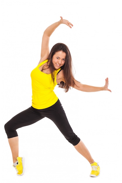 Foto gratuita mujer joven feliz en ropa de fitness