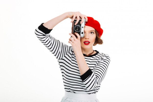 Mujer joven fotógrafo