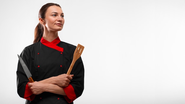 Foto gratuita mujer vistiendo traje de chef