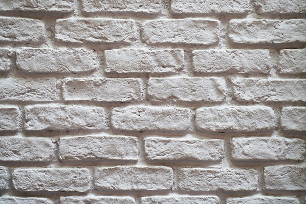 Muro de ladrillos grises desiguales