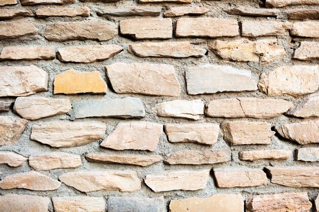 Muro de piedras rotas con espacio de copia para el fondo