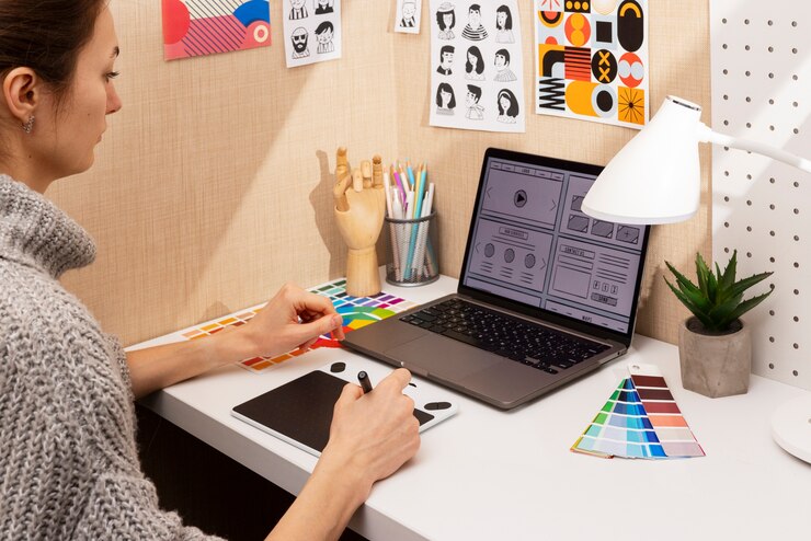Foto gratuito naturaleza muerta de un estudio de diseño gráfico