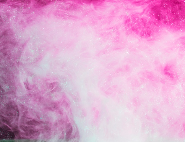 Niebla rosa pesada abstracta con bits azules