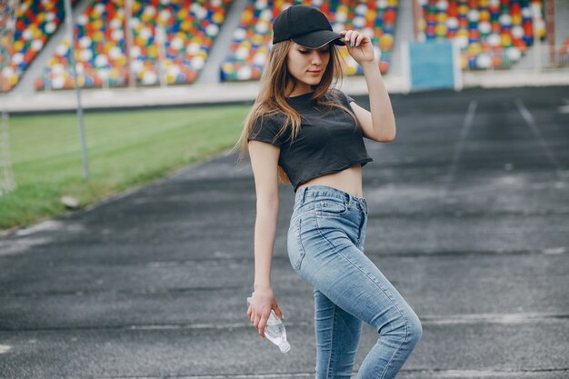 niña en un estadio