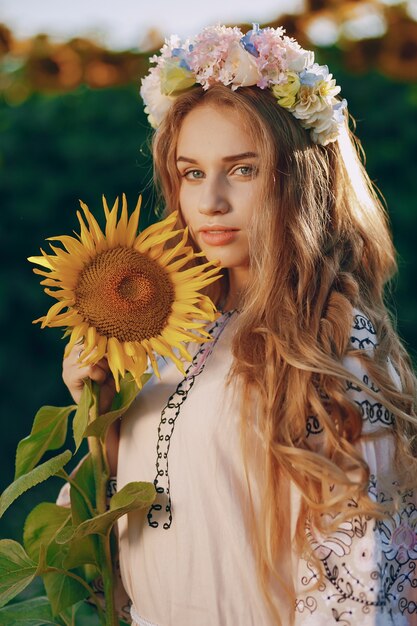 niña y girasoles