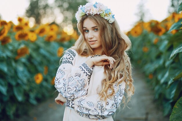 niña y girasoles