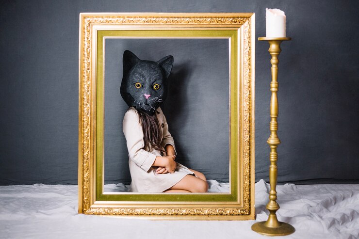 Foto gratuito niña en la máscara del gato