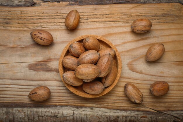 Nueces pecanas en rústica, vista superior