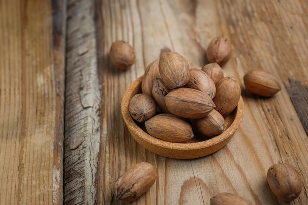 Nueces pecanas en rústica, vista superior