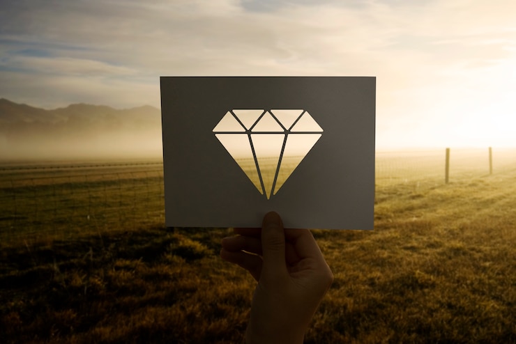 Foto gratuito objetos de valor perforado diamante de papel