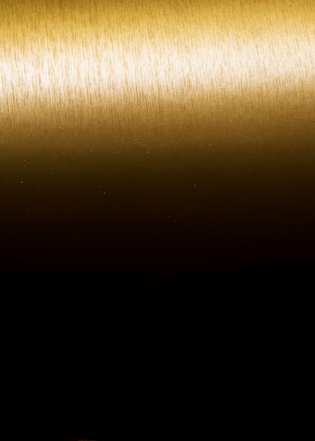 Oro textura fondo degradado vertical negro