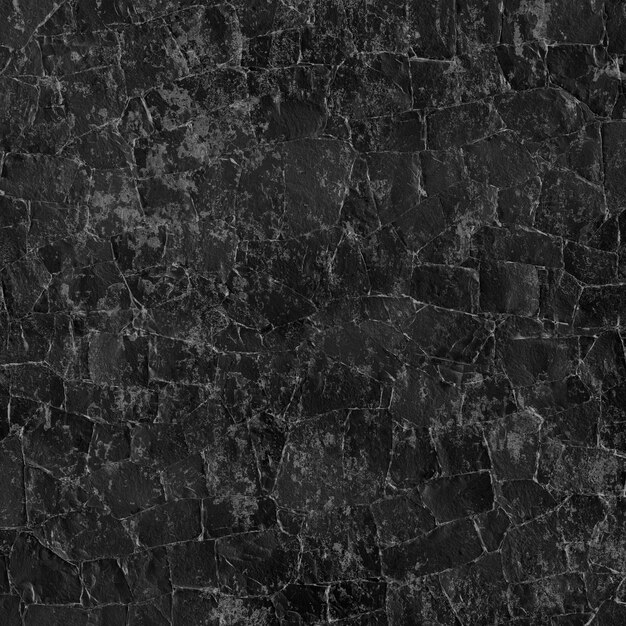 Oscura pared de piedra gris