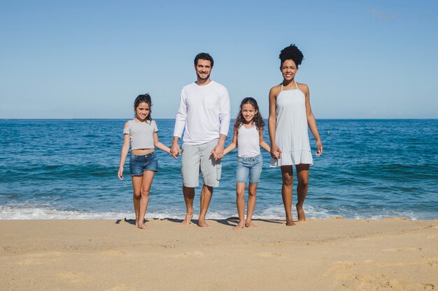 Padres e hijas en la playa