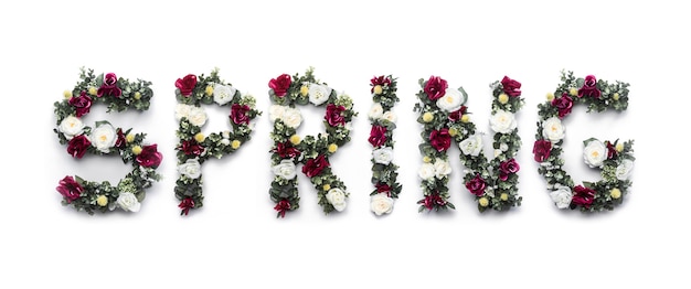 Palabra de primavera hecha de flores en blanco
