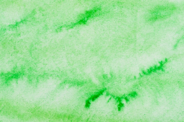 Papel abstracto con textura con telón de fondo de acuarela verde