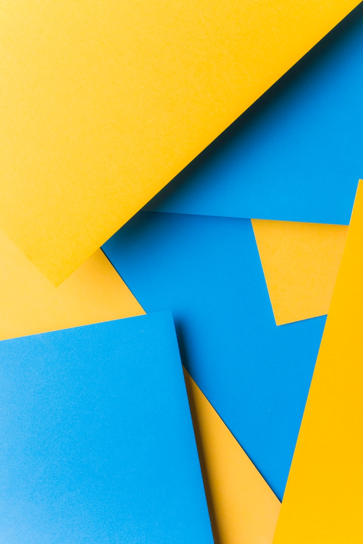 Foto gratuito papel azul sobre el papel de lona amarillo