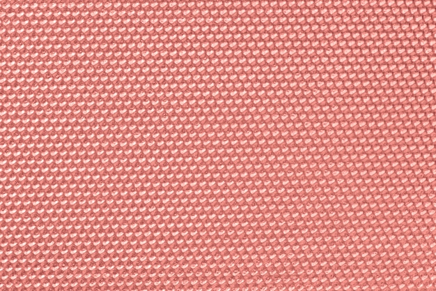 Papel pintado con patrón de panal de color rosa