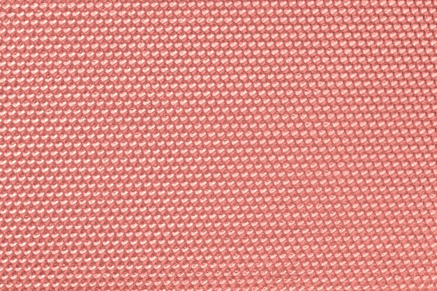 Papel pintado con patrón de panal de color rosa