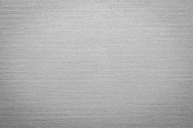 Papel tapiz de color gris claro y textura superficial.