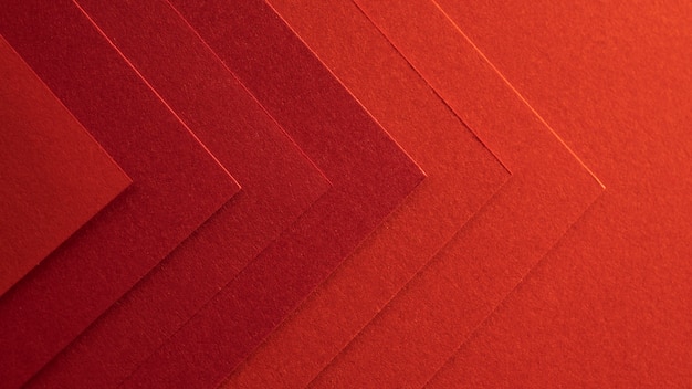 Papeles rojos elegantes en forma de flecha