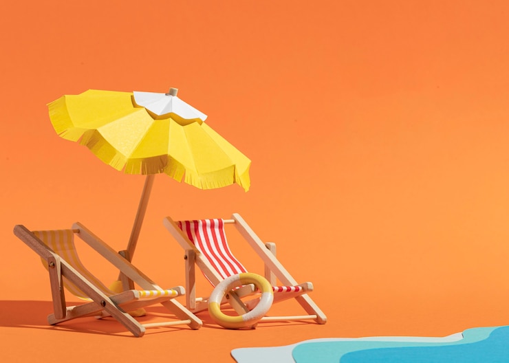 Foto gratuito paraguas de verano con sillas de descanso
