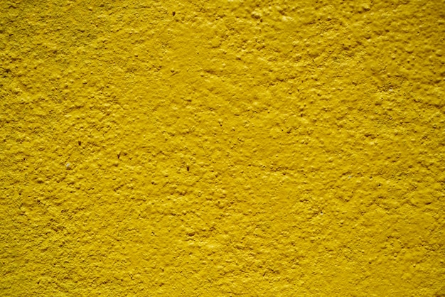 pared detalle macro pintado de amarillo